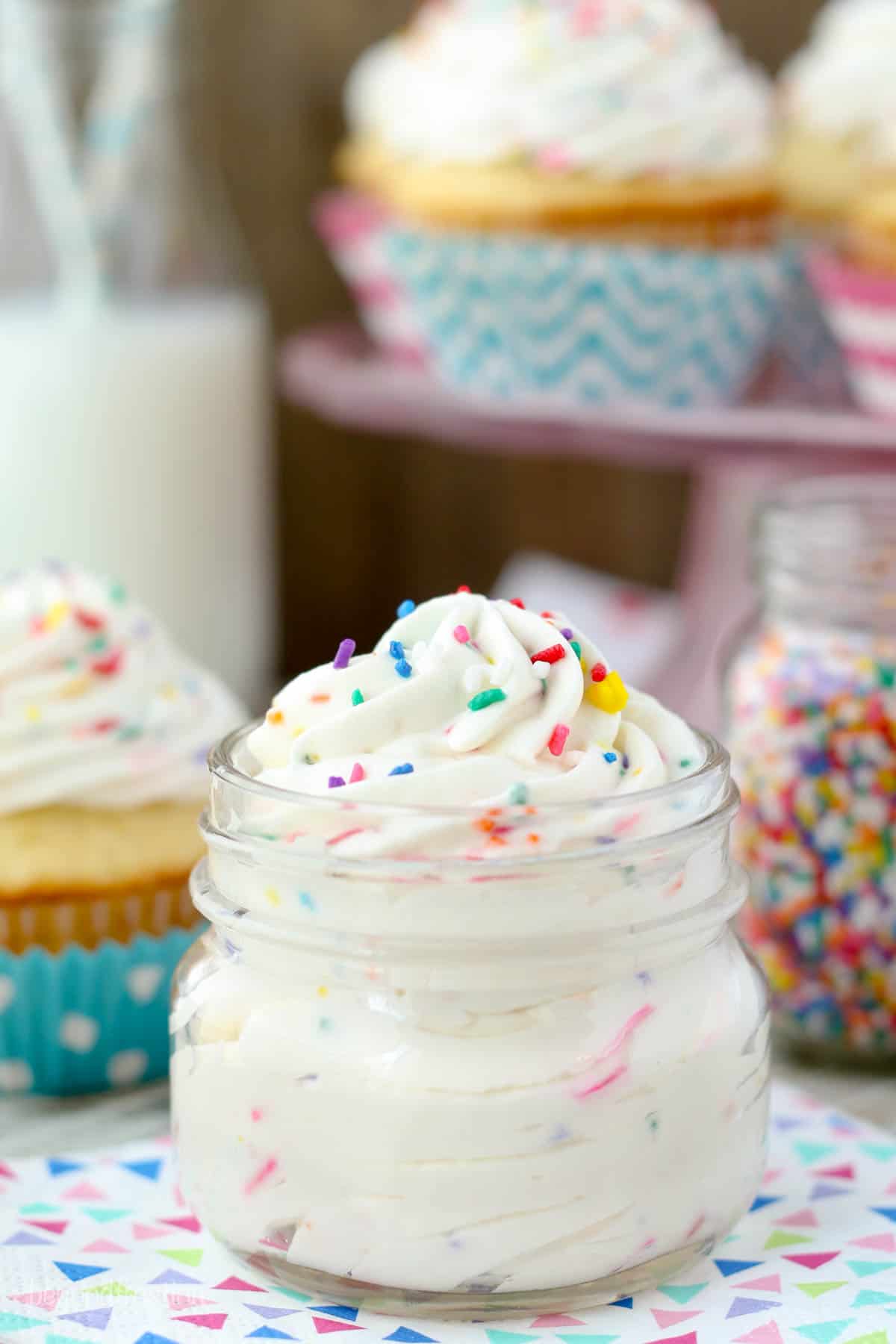 A glass jar of cake batter whipped cream