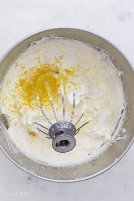 Mascarpone whipped cream ingredients in a bowl