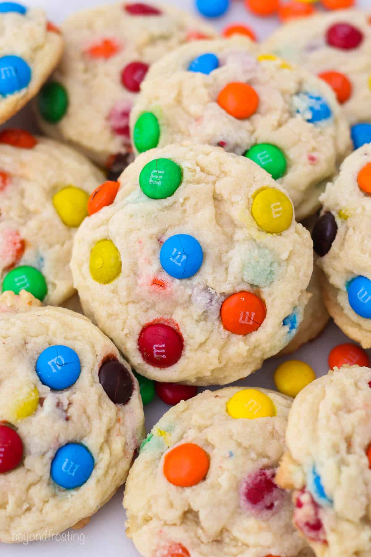 Overhead view of a pile of M&M cookies.