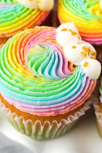 Overhead view of rainbow frosted cupcakes
