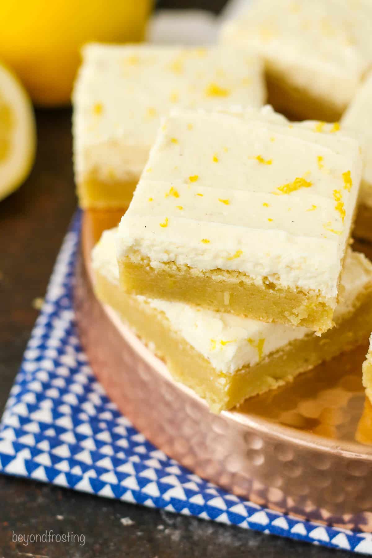 overhead of a platter piled with lemon cookie bars