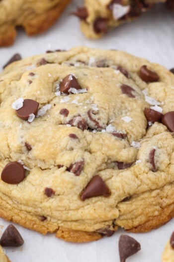 Angled view of an extra thick chocolate chip cookie