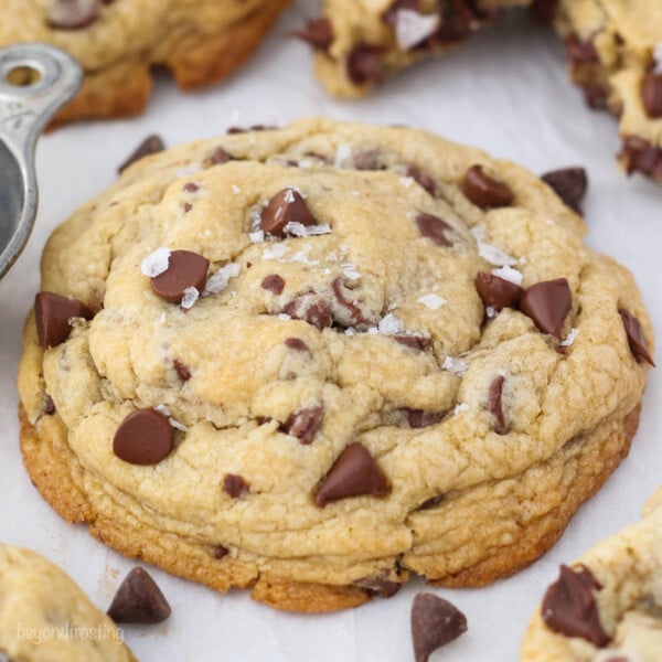 Angled view of an extra thick chocolate chip cookie