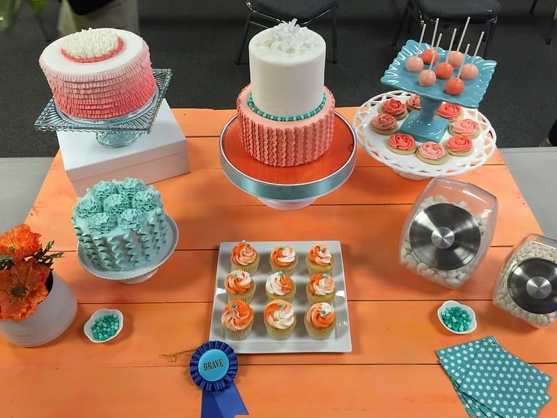 Styled dessert tables with cakes and cupcakes