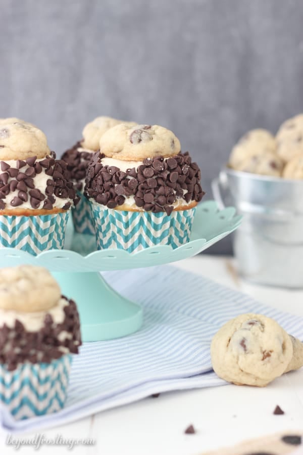 cookie dough cupcakes on a teal cake platter