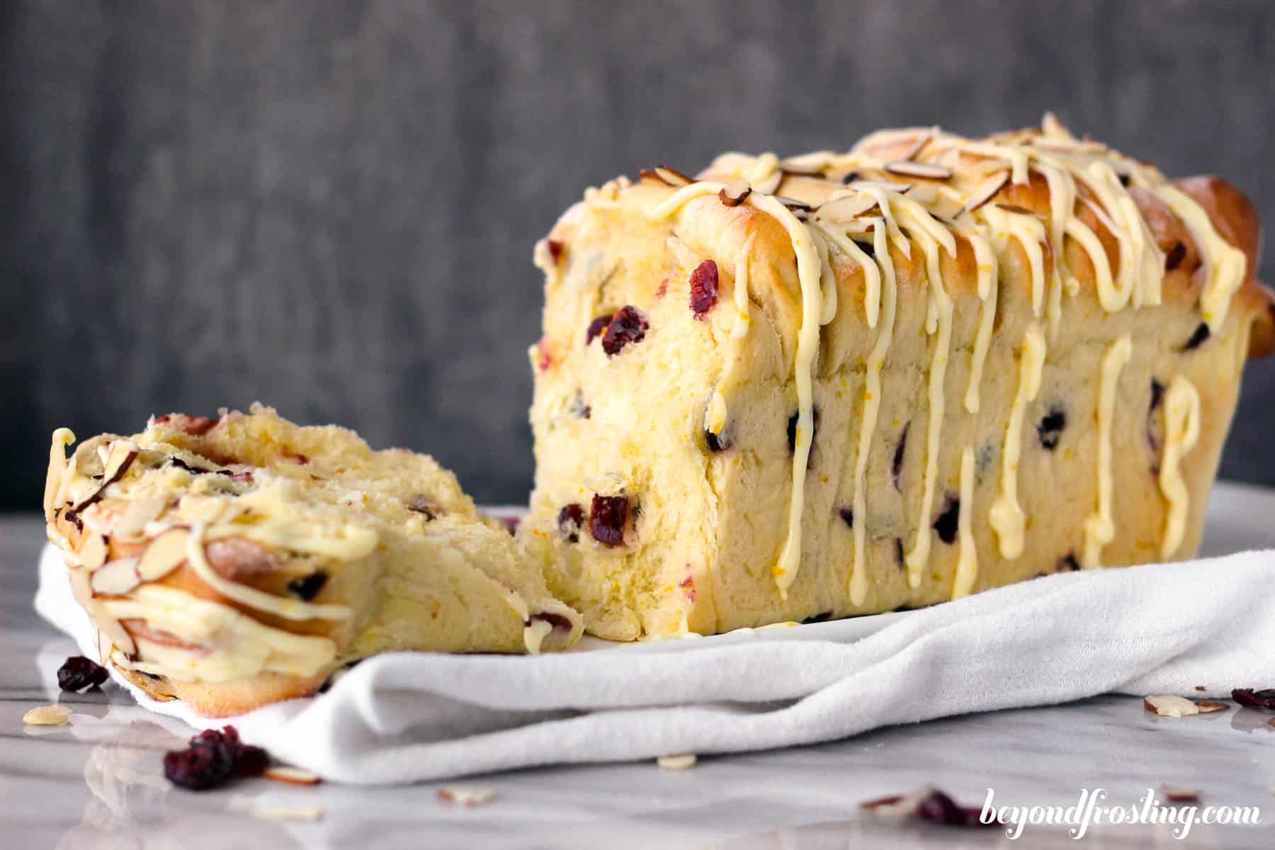 a sliced sweet bread loaf with glaze