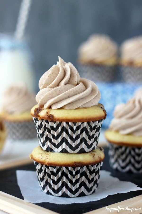 two cinnamon roll cupcakes stacked