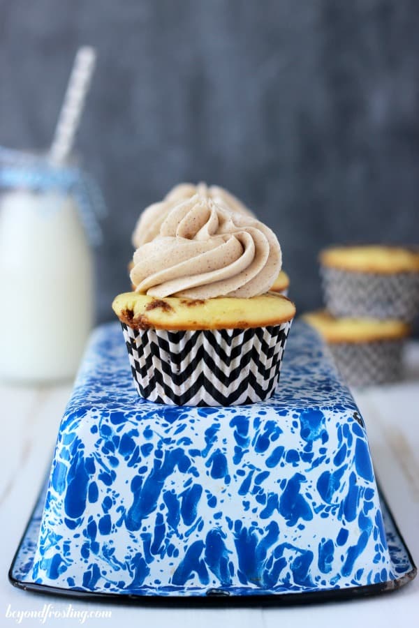 cinnamon roll cupcake on top of an upside down baking pan