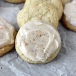 closeup of eggnog sugar cookies on parchment paper