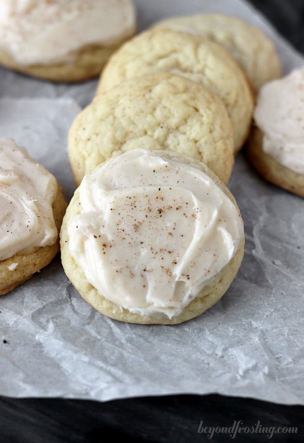 closeup of eggnog sugar cookies on parchment paper