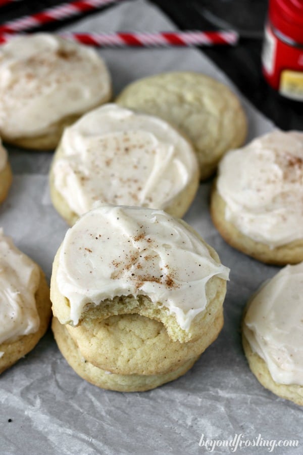 stacks of eggnog sugar cookies on parchment paper