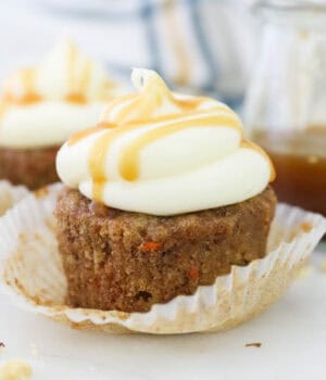 A gluten-free carrot cake cupcake with cream cheese frosting