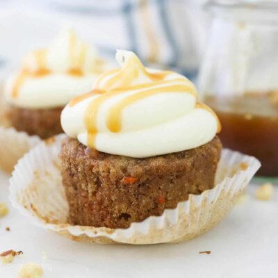 A gluten-free carrot cake cupcake with cream cheese frosting