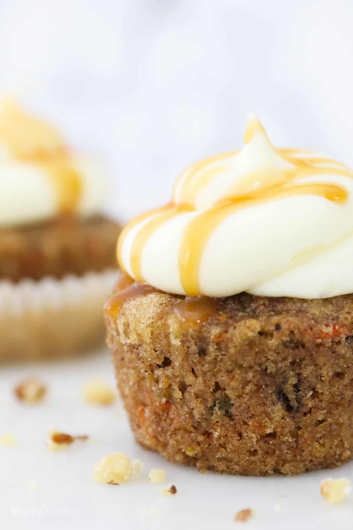Close-up on a carrot cake cupcake with cream cheese frosting