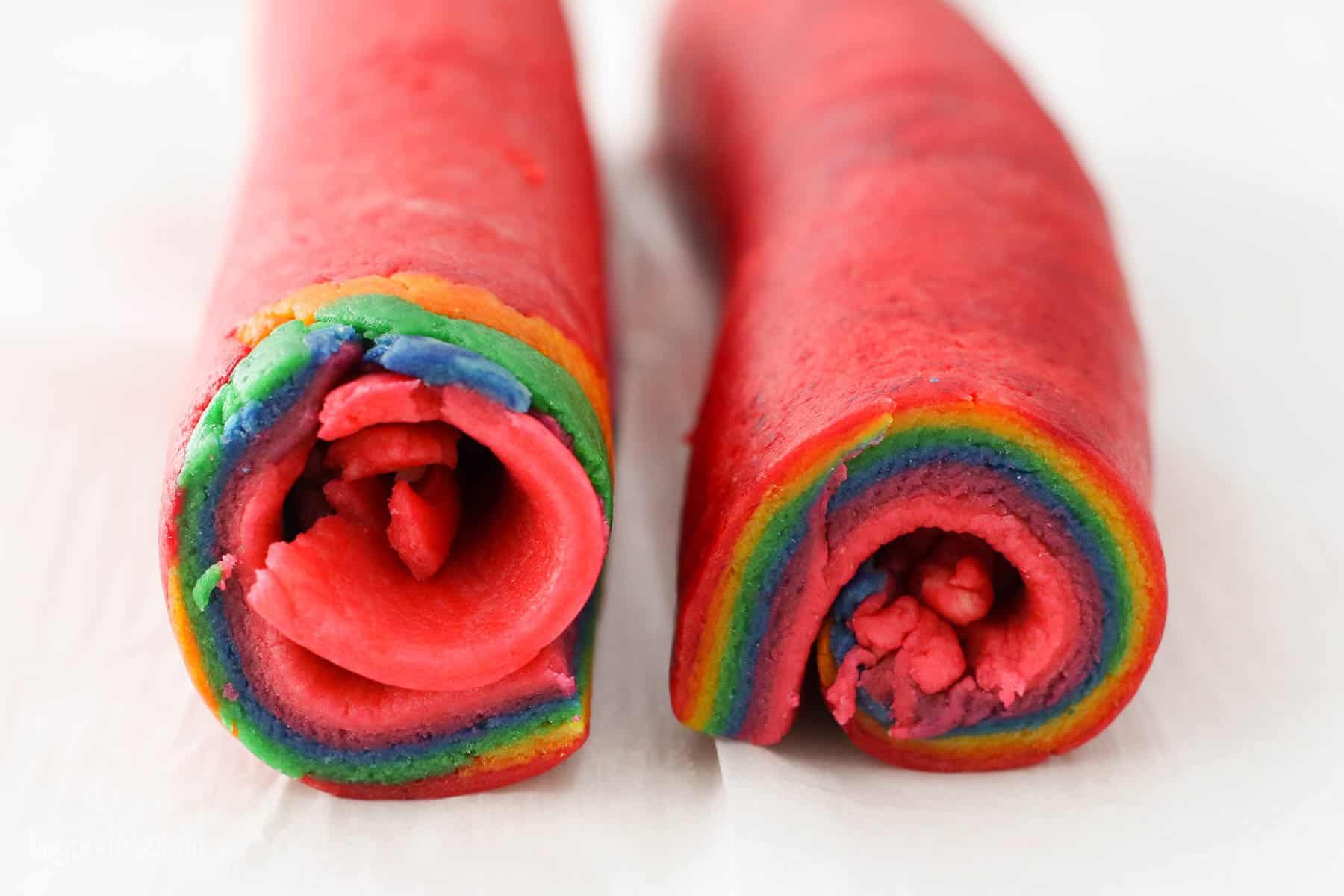 Two rolls of rainbow sugar cookie dough