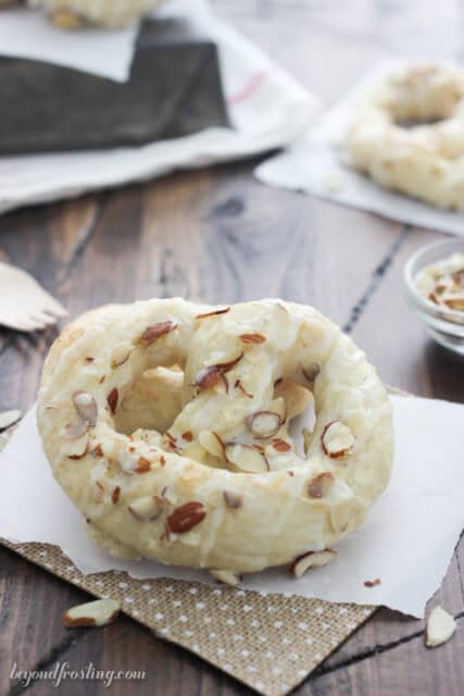 two soft pretzels stacked on a napkin