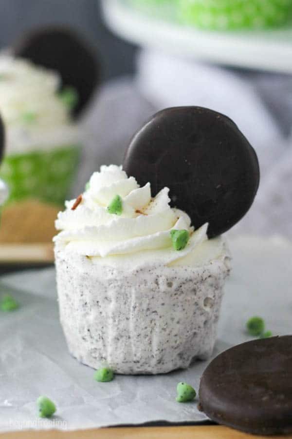 unwrapped thin mint ice cream cupcake topped with a thin mint cookie