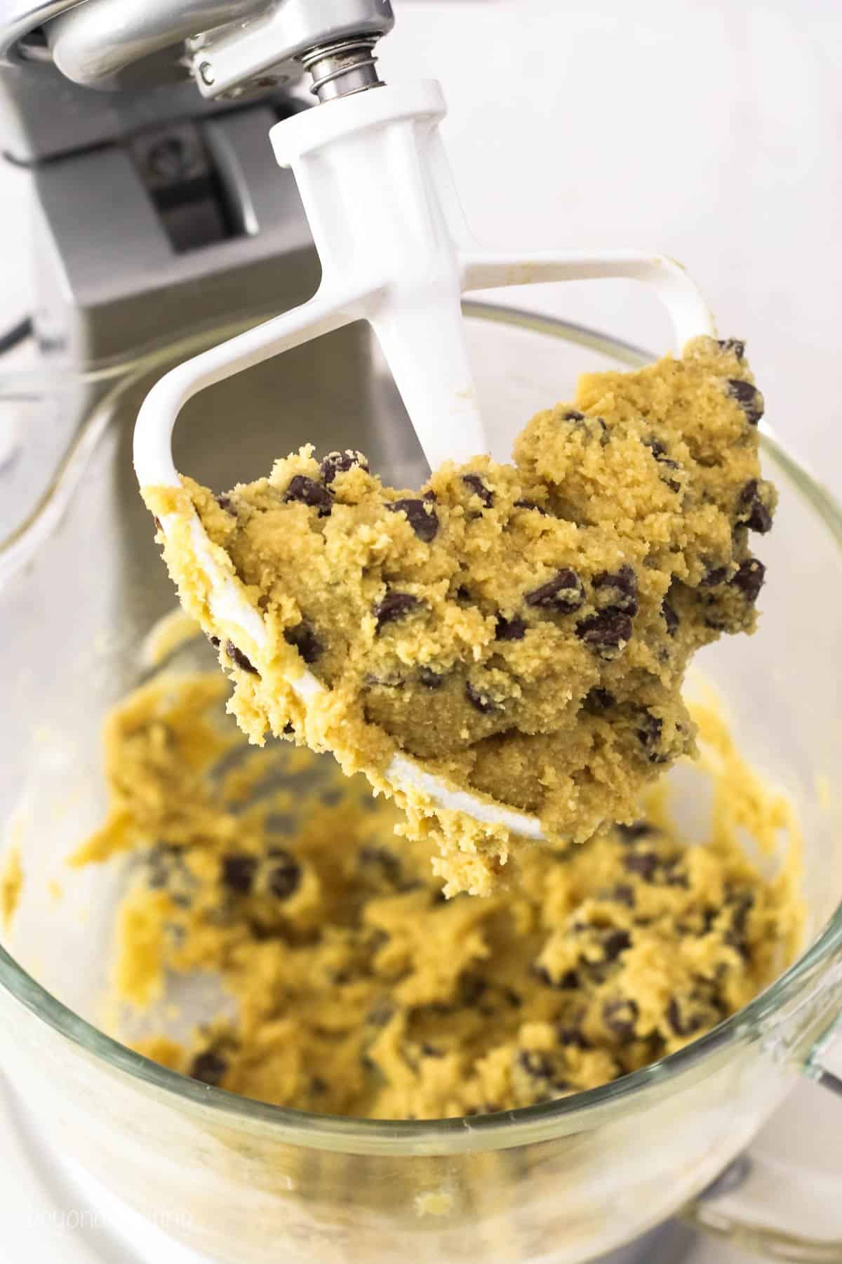 Chocolate chip cookie dough on a mixer