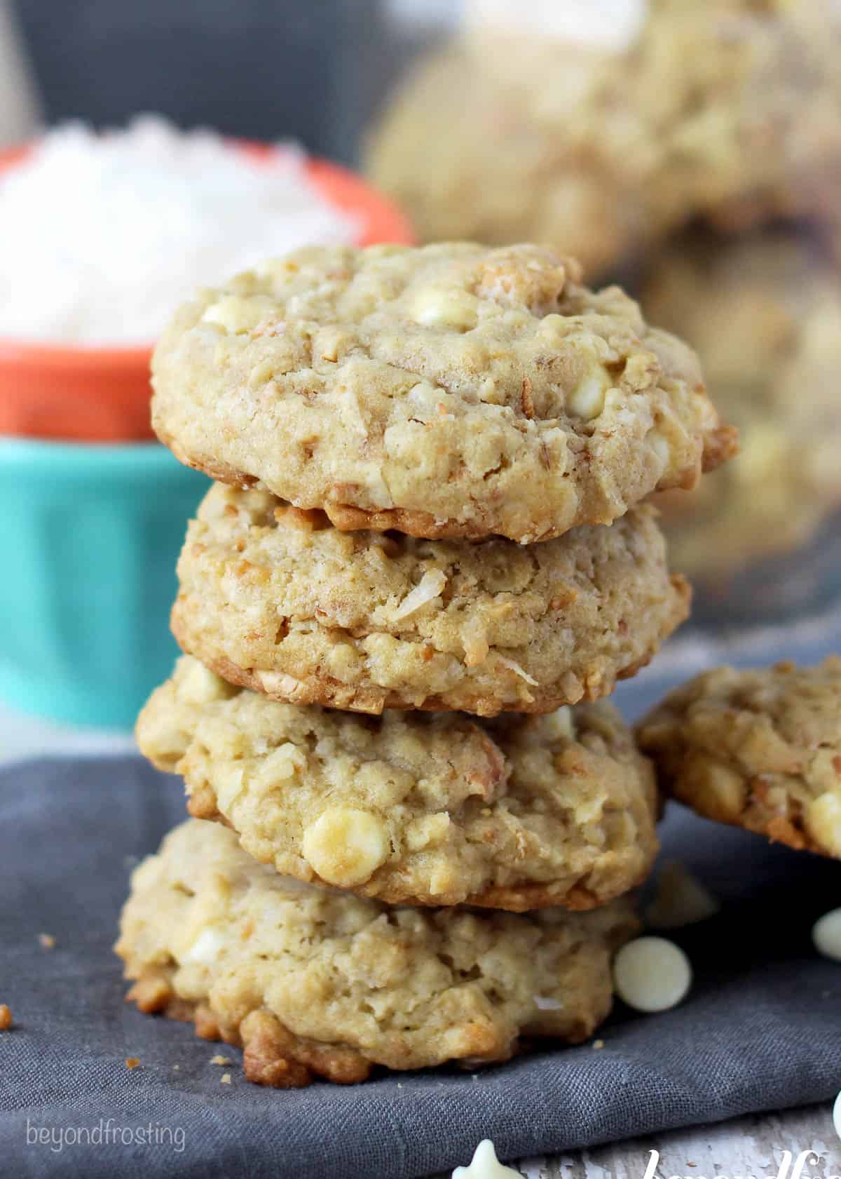 four coconut cashew cookies stacked