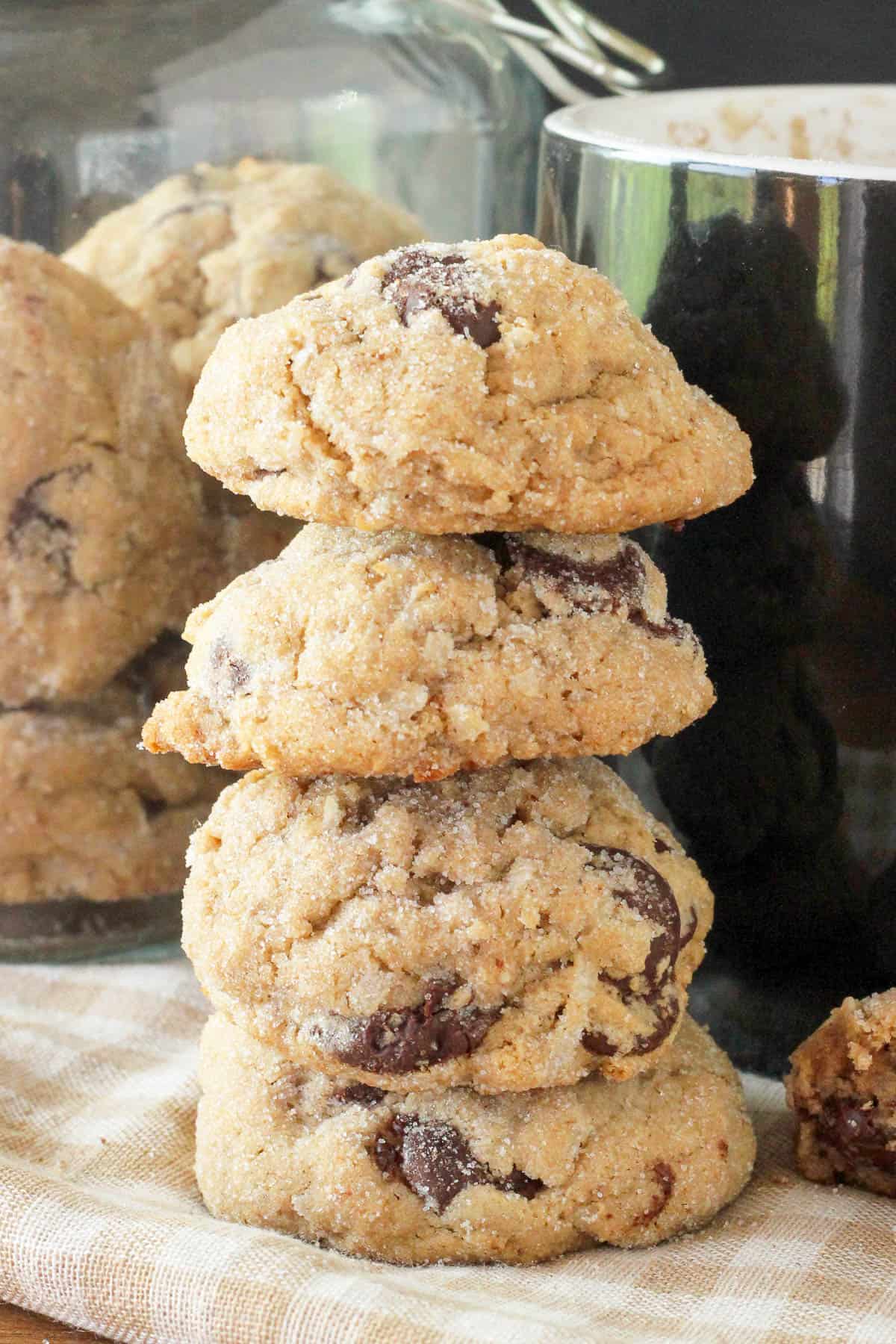 four coconut chai chocolate chip cookies stacked