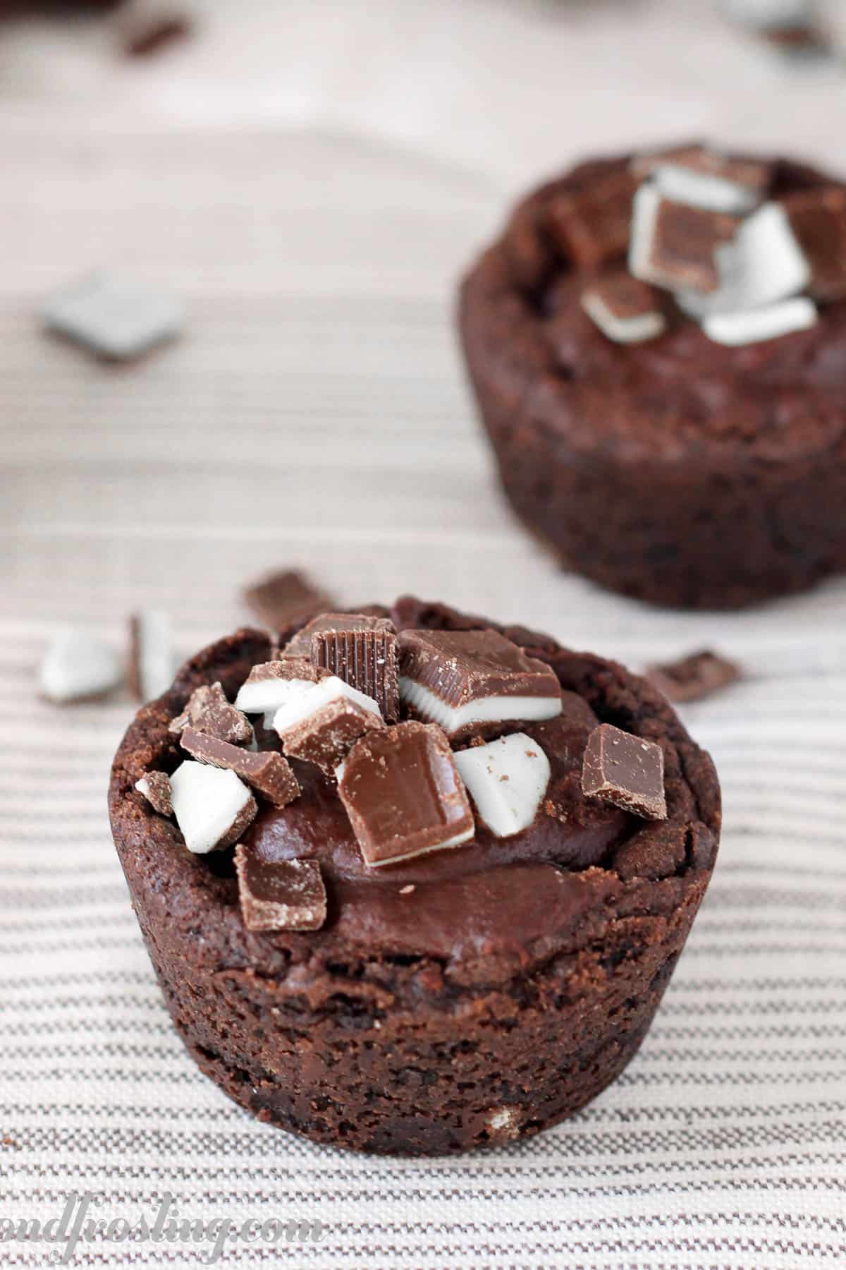 overhead of a dark chocolate cookie cup with another in the background
