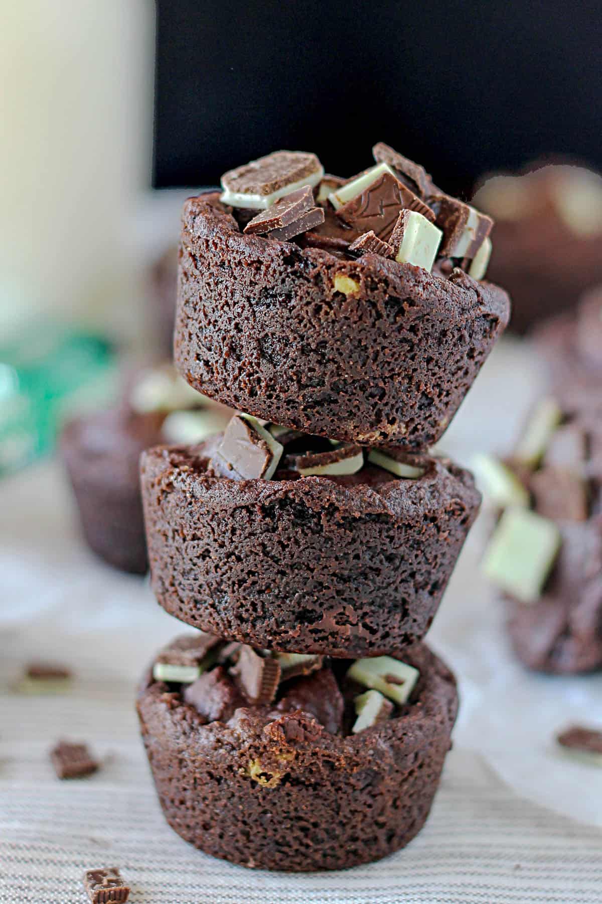 three dark chocolate Andes cookie cups stacked