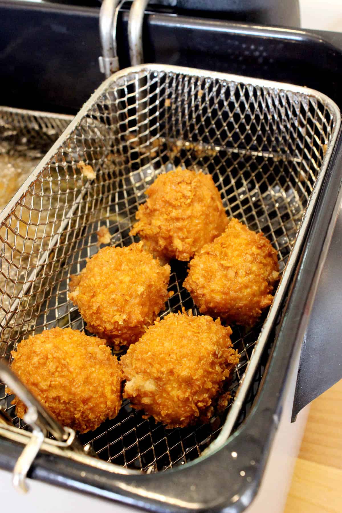 cookie dough bites in a fryer basket