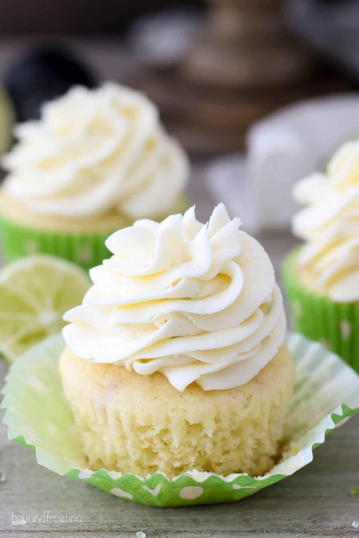 An unwrapped Margarita cupcake with a vanilla lime frosting