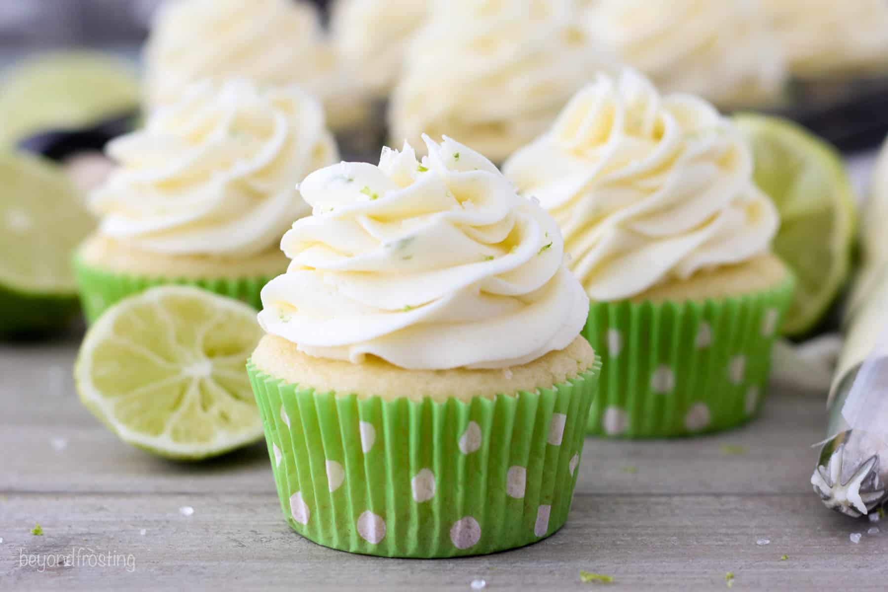 Three Margarita cupcakes in green polka dot cupcake liners