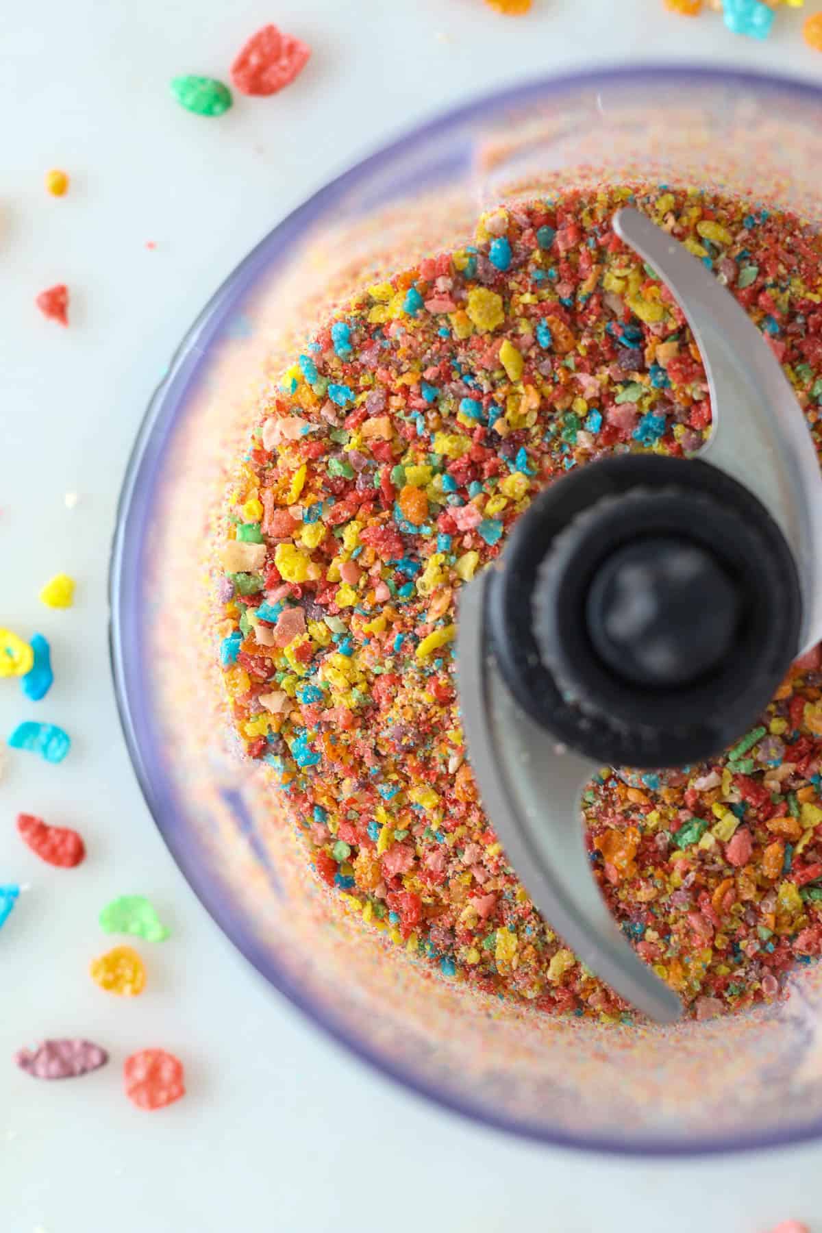 A food processor with ground up Fruity Pebble cereals
