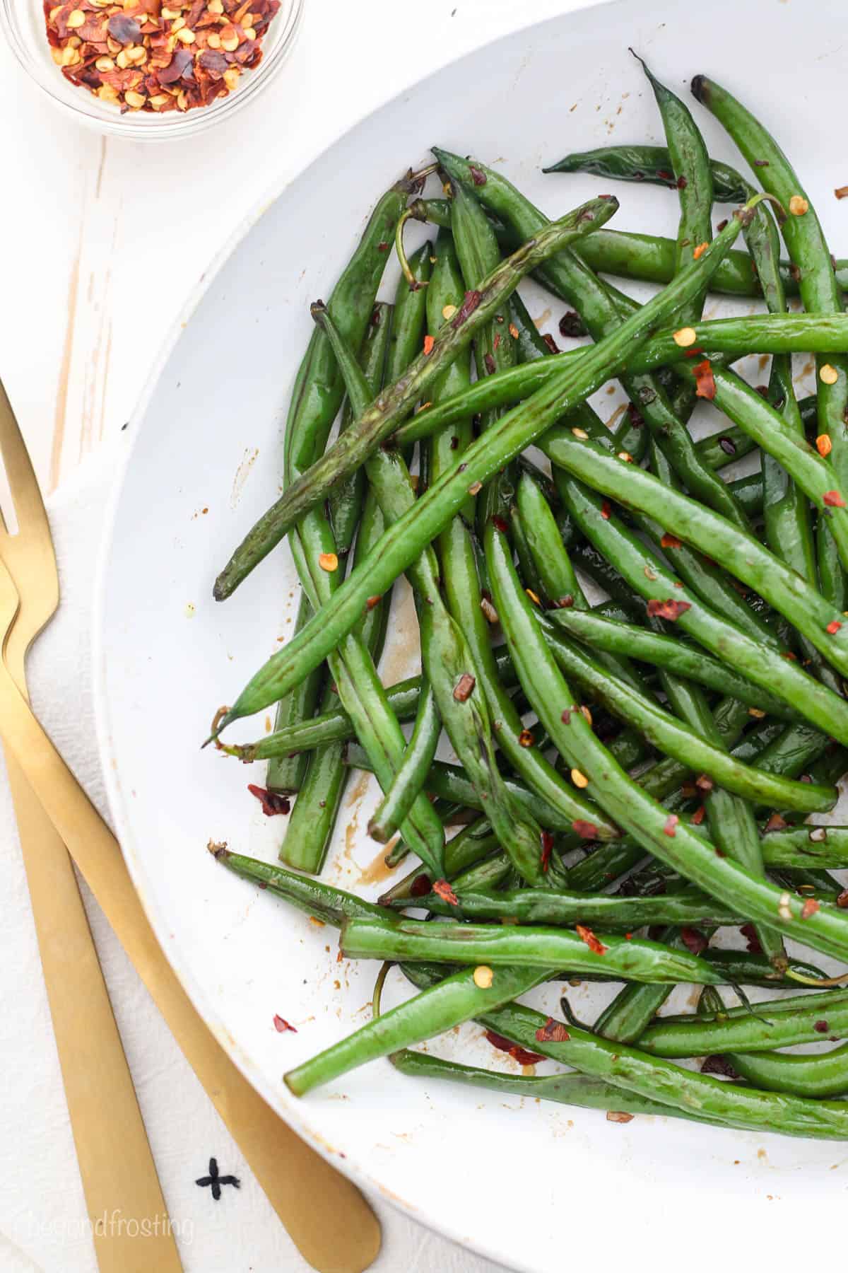 overhead of a plate filled with cooked green beans