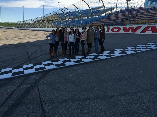 A group of ladies posing on the Iowa Speedway
