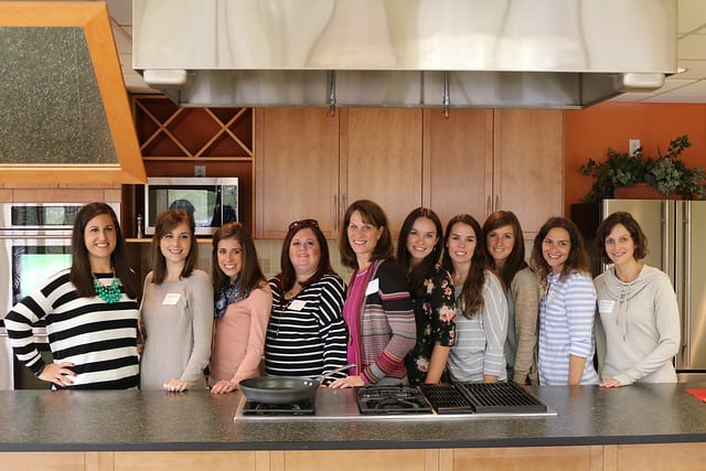 A group of ladies posing in the test kitchen