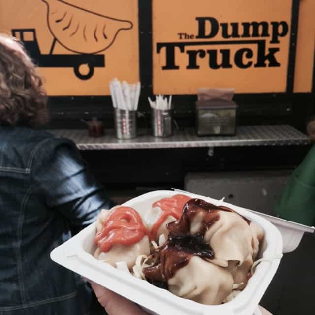 A take-out container of dumplings from Dump Truck