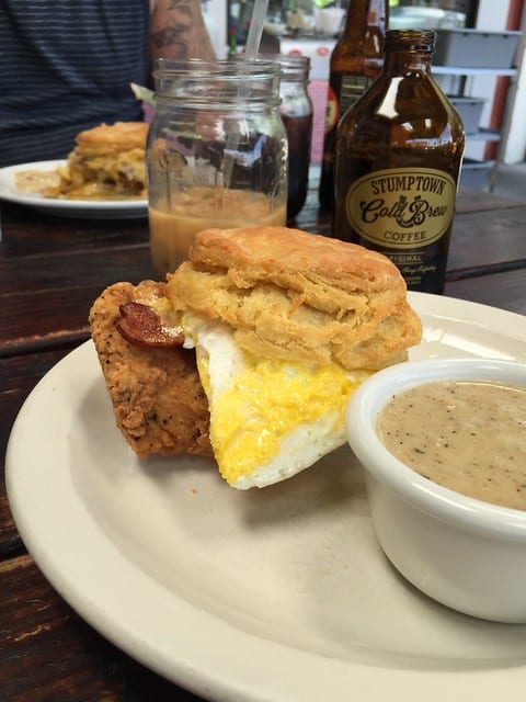 Close-up of a breakfast sandwich on a biscuit at Pine State Biscuit