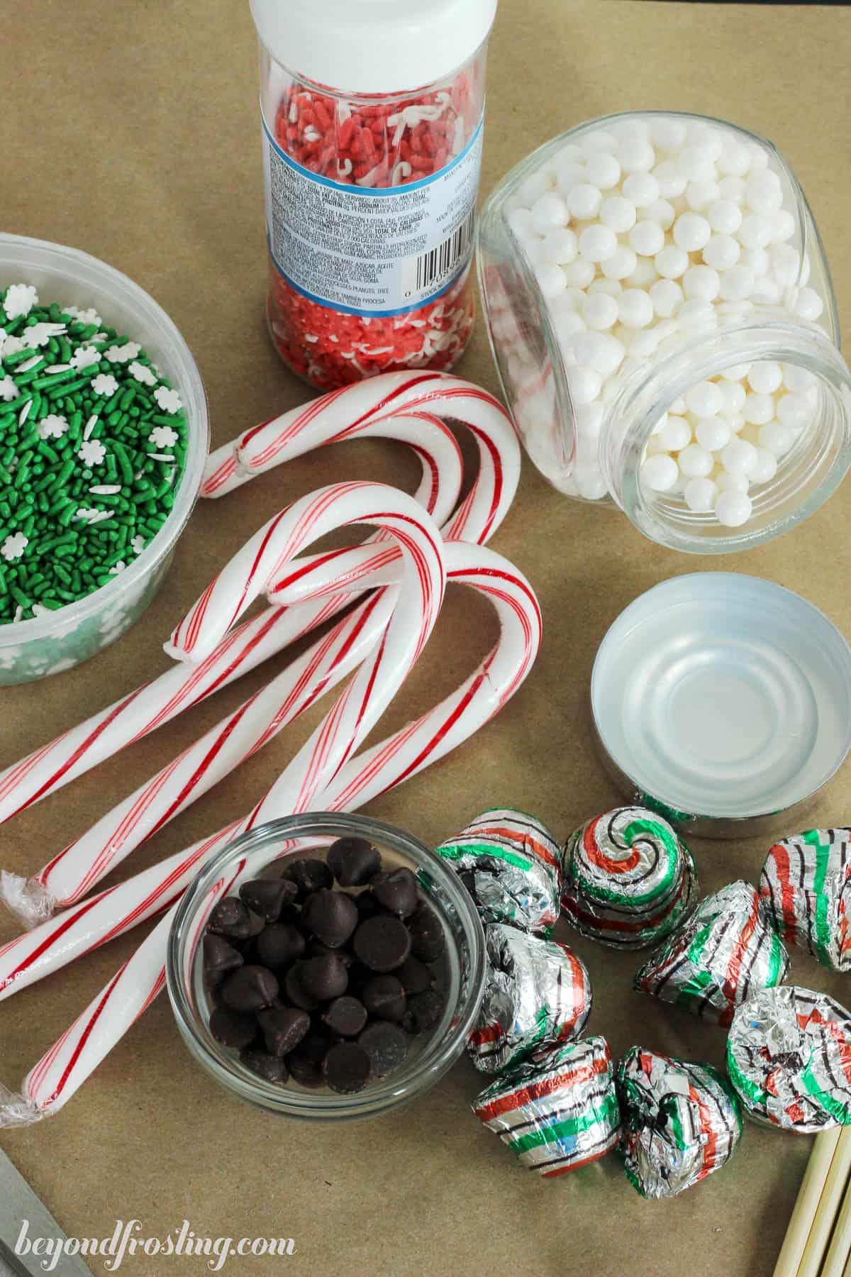 overhead of candy decorations for cupcake snowmen