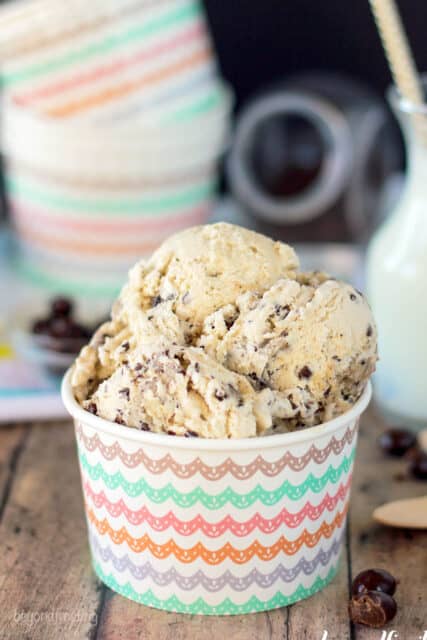 a paper cup full of scoops of espresso chip cookie dough ice cream