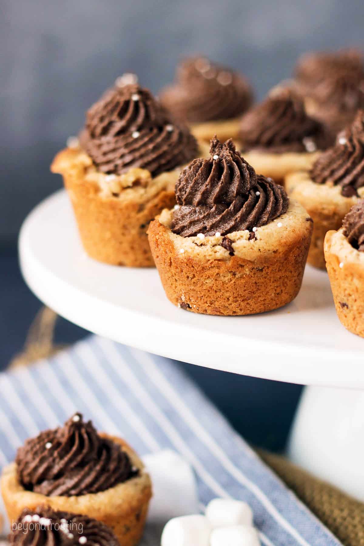 side view of a cake stand filled with cookie cups