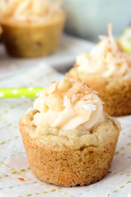 side view of a cookie cup with another couple in the background