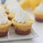 closeup of a frosted lemon cookie cup lined with other cookie cups