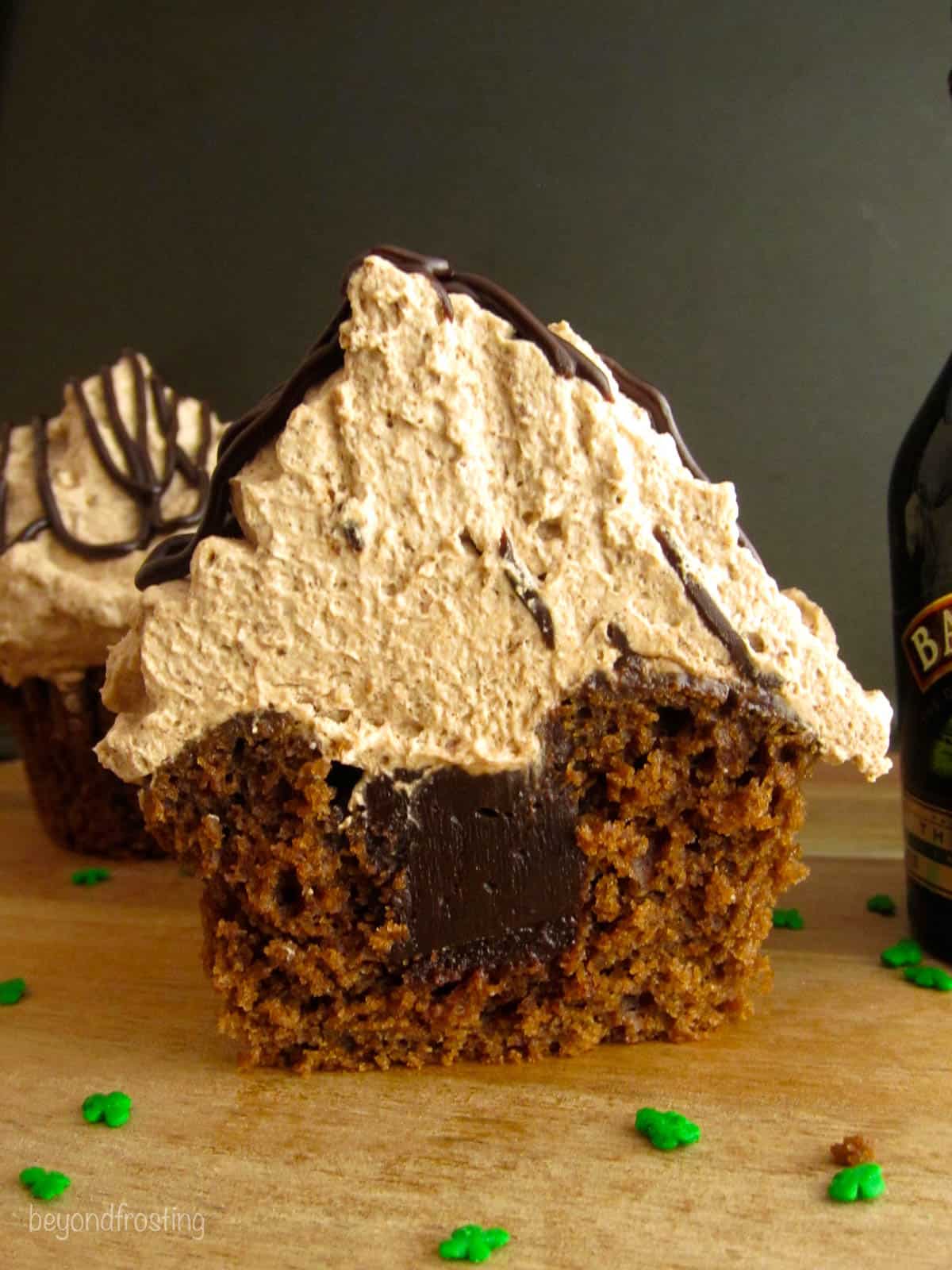 closeup of half of an irish cream cupcake filled with chocolate