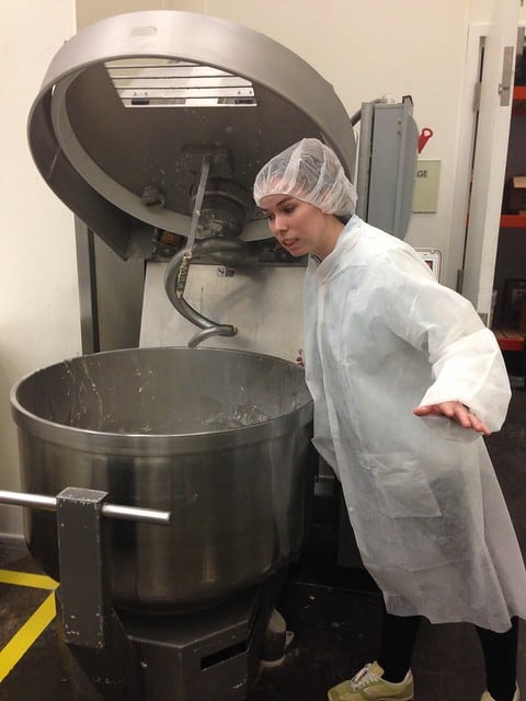 Blog author looking into a giant mixer at Homeboy