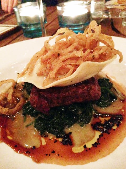 Close-up of Ravioli dish from Little Beast Restaurant topped with crispy onions