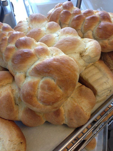 A stack of braided loaves of bread