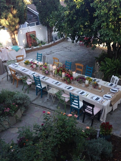 Overhead view of a table for an outdoor summer solstice potluck party