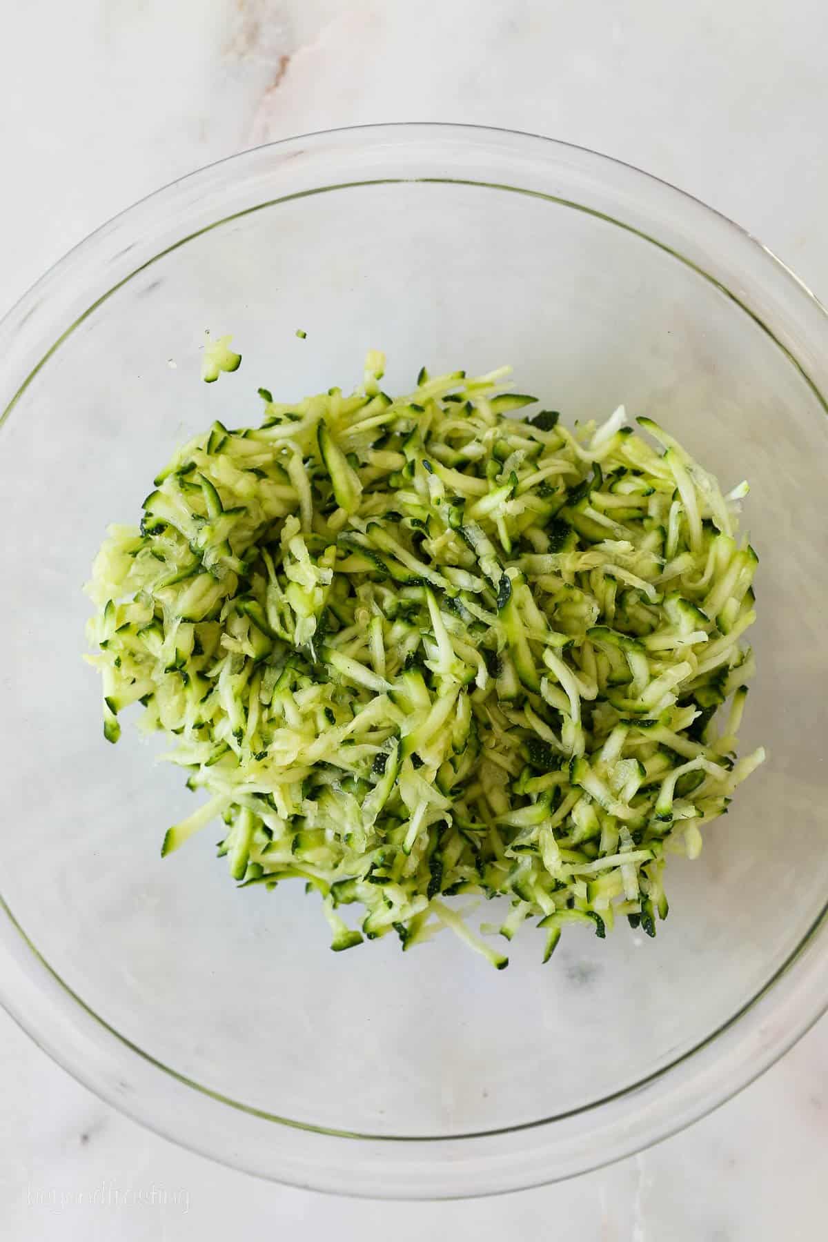 Shredded zucchini in a bowl