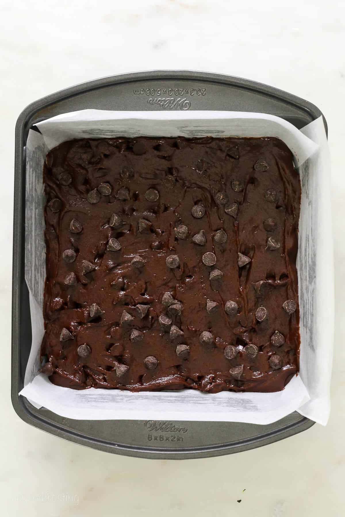 8-inch baking pan filled with brownie batter