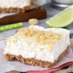 side view of a coconut lime cheesecake bar