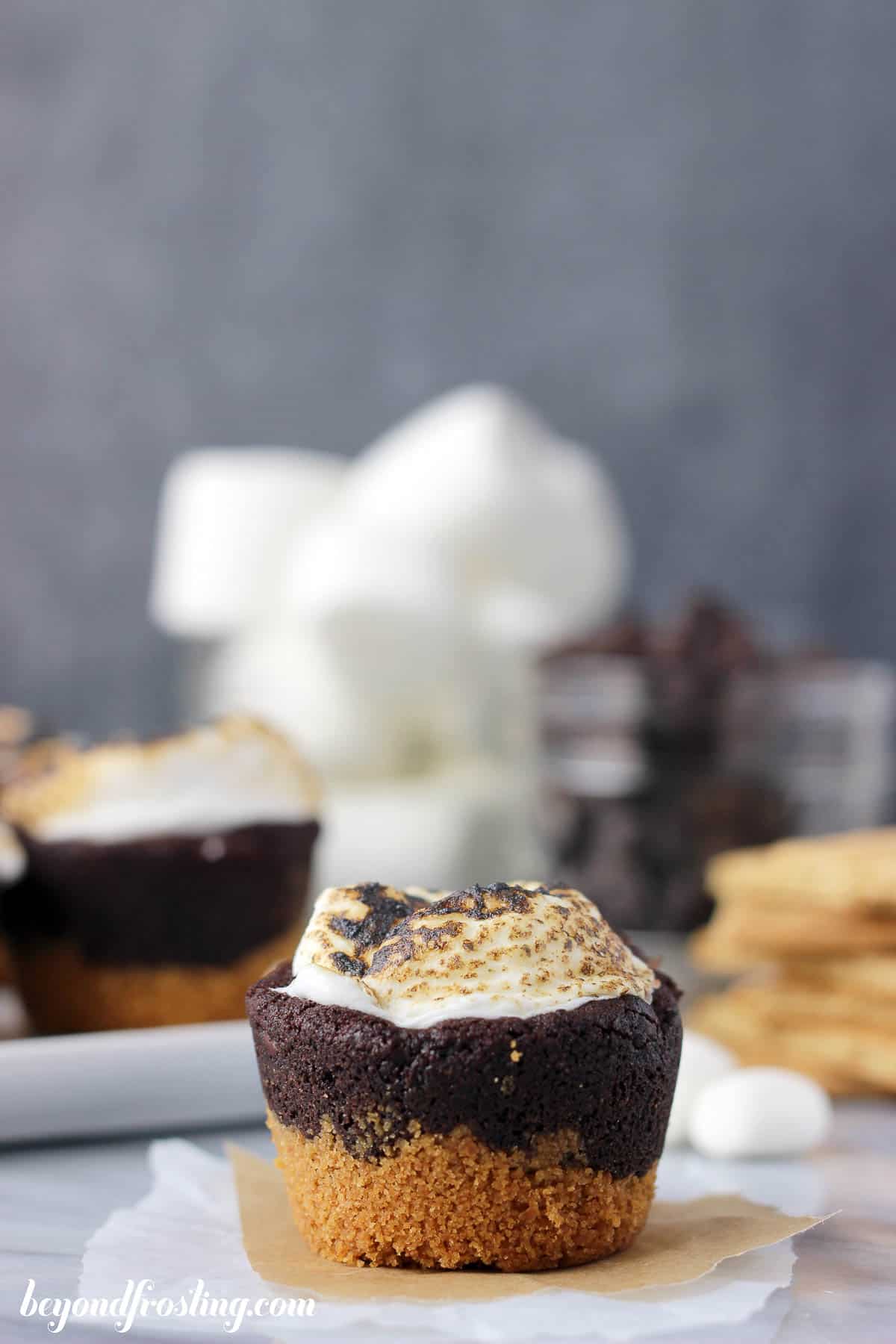side view of a s'more cookie cup with more in the background