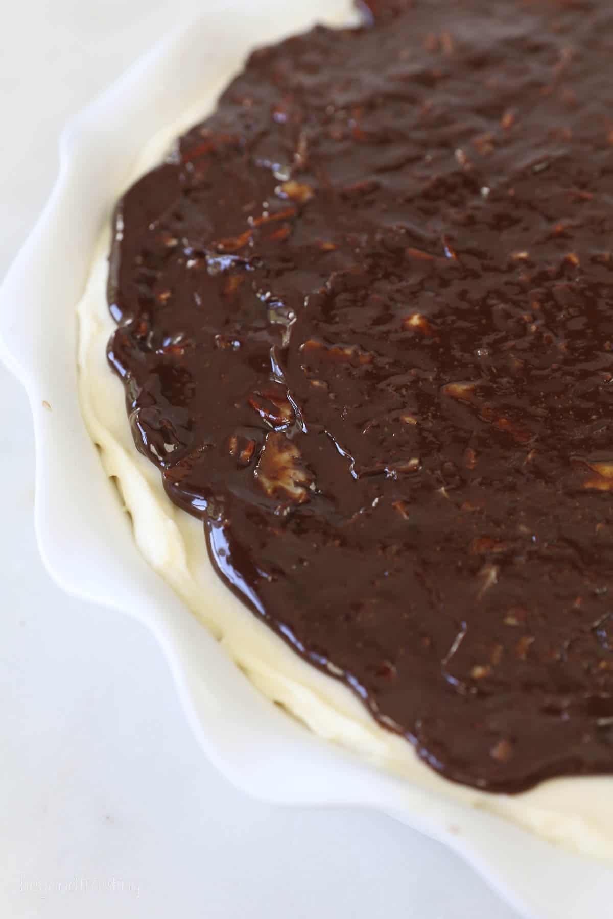 Chocolate ganache on top of cheesecake filling